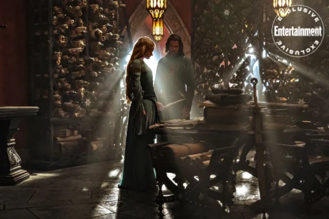 The Lord of the Rings: The Rings of PowerGaladriel (Morfydd Clark) and Elendil (Lloyd Owen) review historical documents in Númenor.CR: Matt Grace / Prime Video