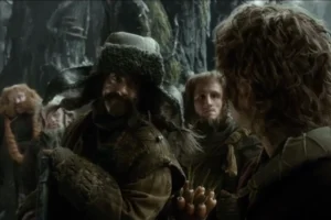 Los Enanos miran a Bilbo
